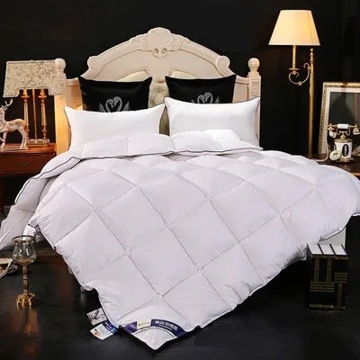 couette 100 pourcent duvet d'oie quatre saisons confort optimal hiver