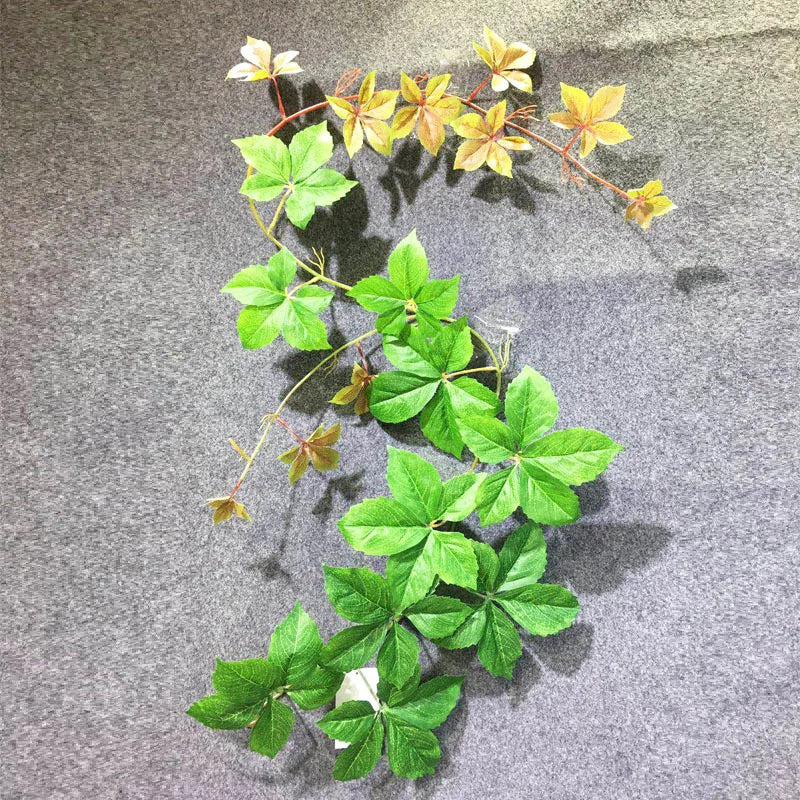 plantes artificielles avec grandes feuilles pour décoration murale