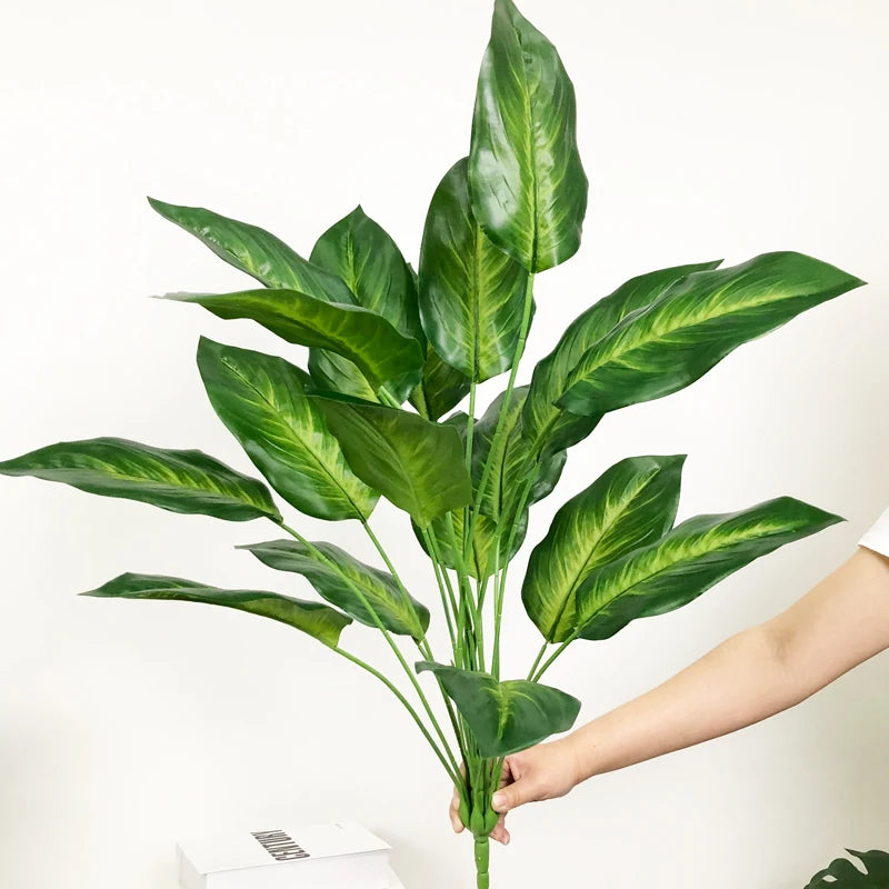 plantes artificielles strelitzia et monstera pour décoration tropicale