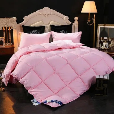 couette 100 pourcent duvet d'oie quatre saisons confort optimal hiver