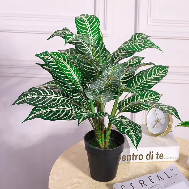 bouquet de plantes artificielles monstera tropicales pour décoration intérieure