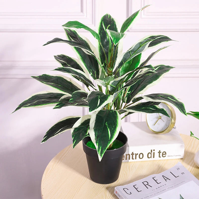 bouquet de plantes artificielles monstera tropicales pour décoration intérieure