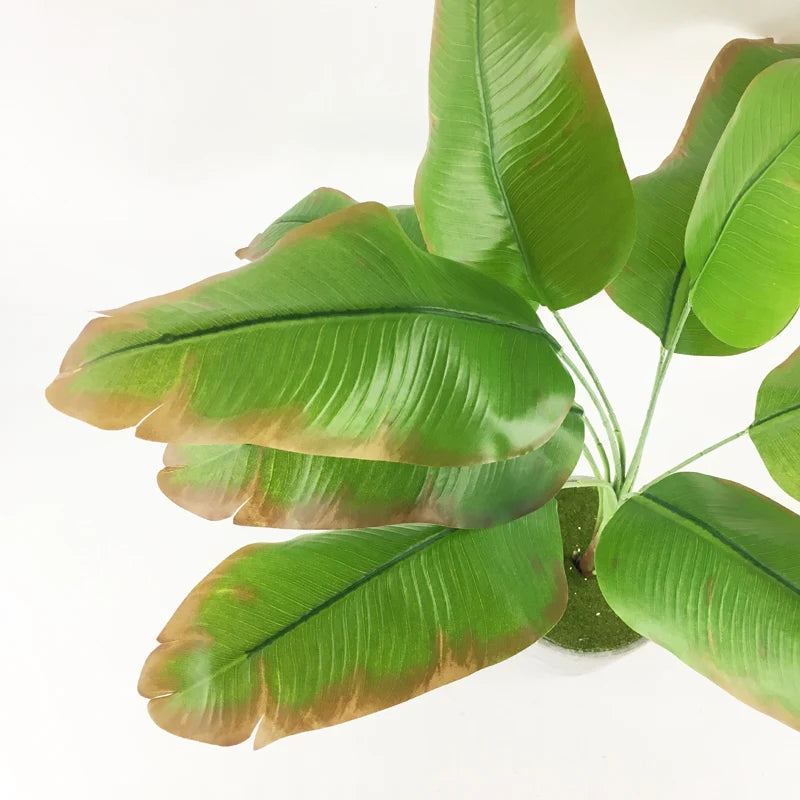 grandes plantes artificielles monstera et bananier pour décoration intérieure