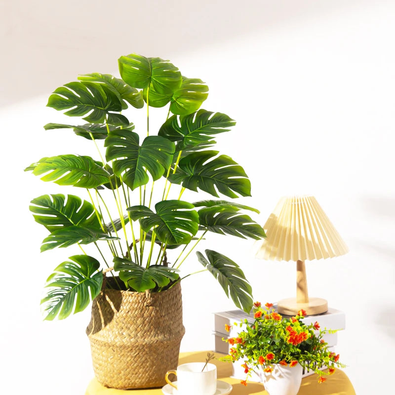 arbre tropical artificiel avec grandes feuilles de monstera décoratif