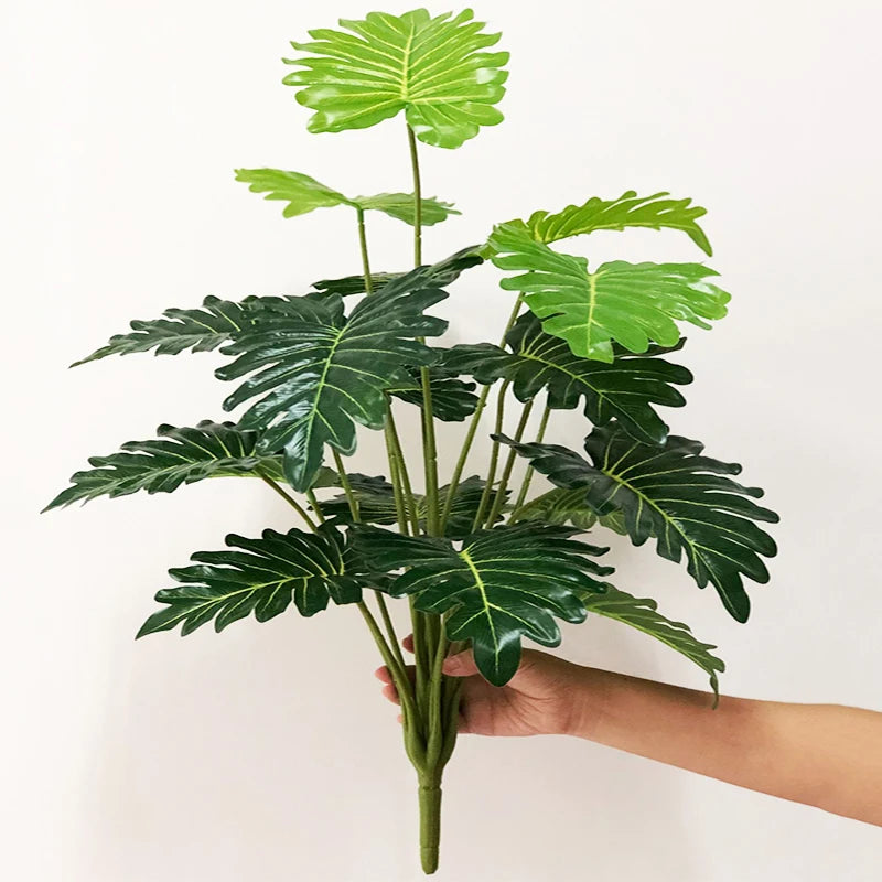 plantes monstera artificielles pour décoration tropicale et festive