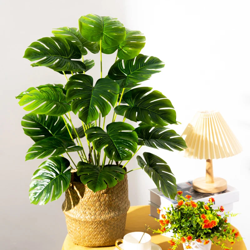 arbre tropical artificiel avec grandes feuilles de monstera décoratif