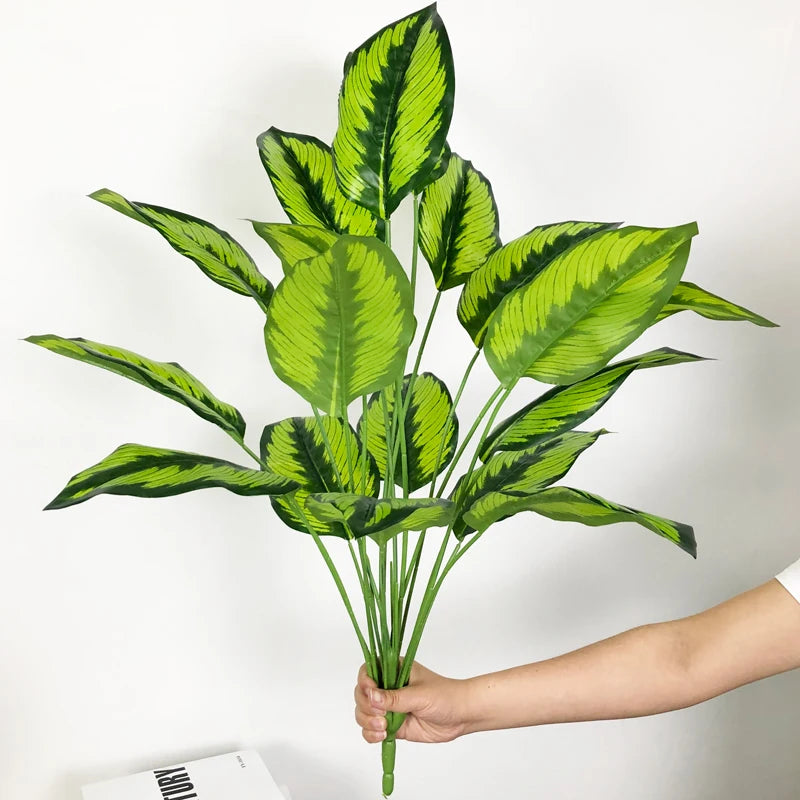 plantes artificielles strelitzia et monstera pour décoration tropicale