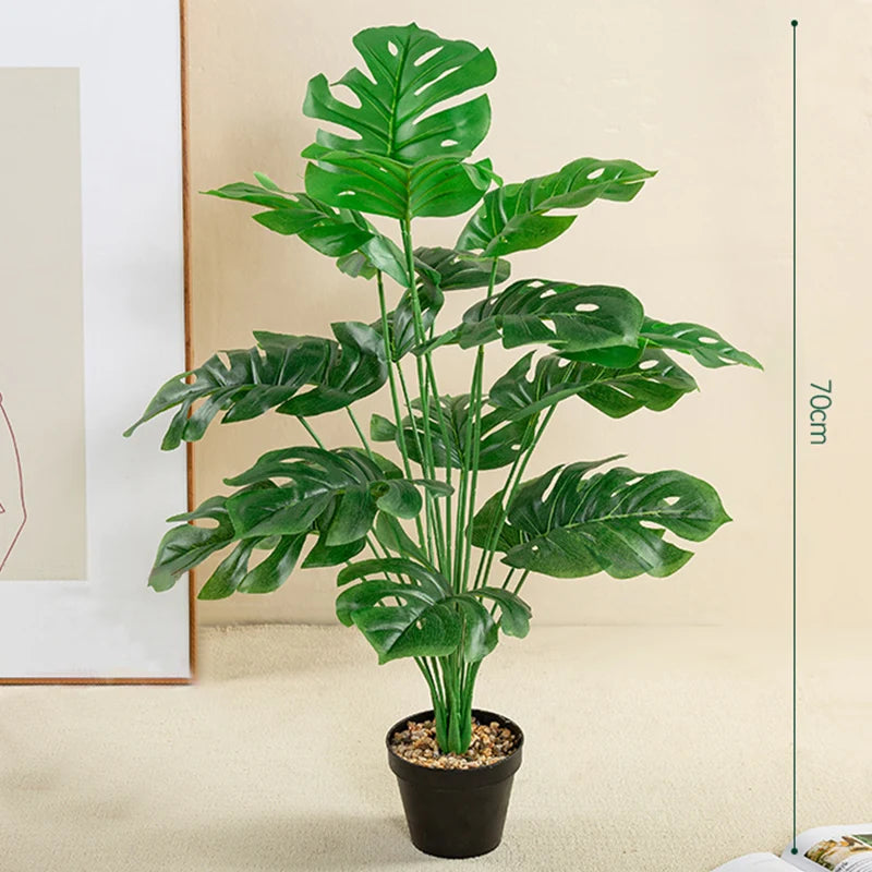 grand palmier artificiel avec branches de monstera pour décoration extérieure