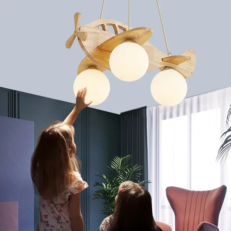 lustre moderne en bois fait main pour chambre enfant décor avion