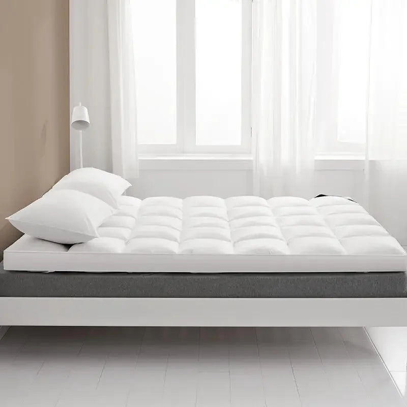 matelas moelleux en plumes surmatelas haut de gamme pour confort optimal