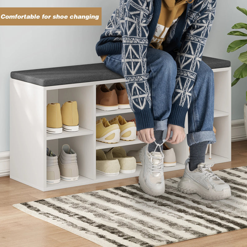 banc de rangement à chaussures avec coussin et compartiments pratiques