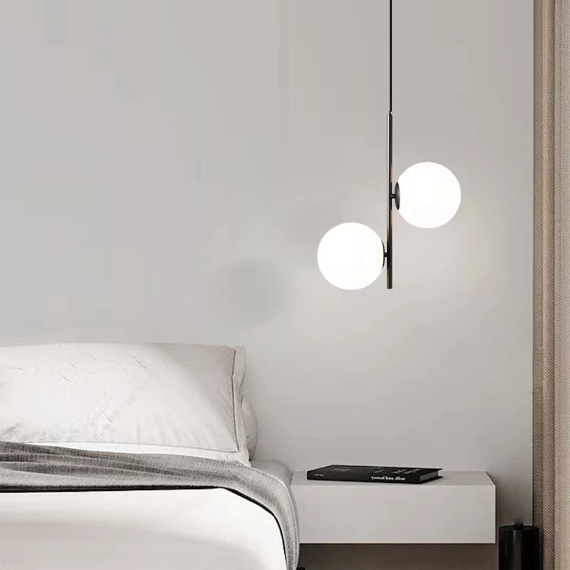 suspension moderne en verre et laiton noir design lumineux