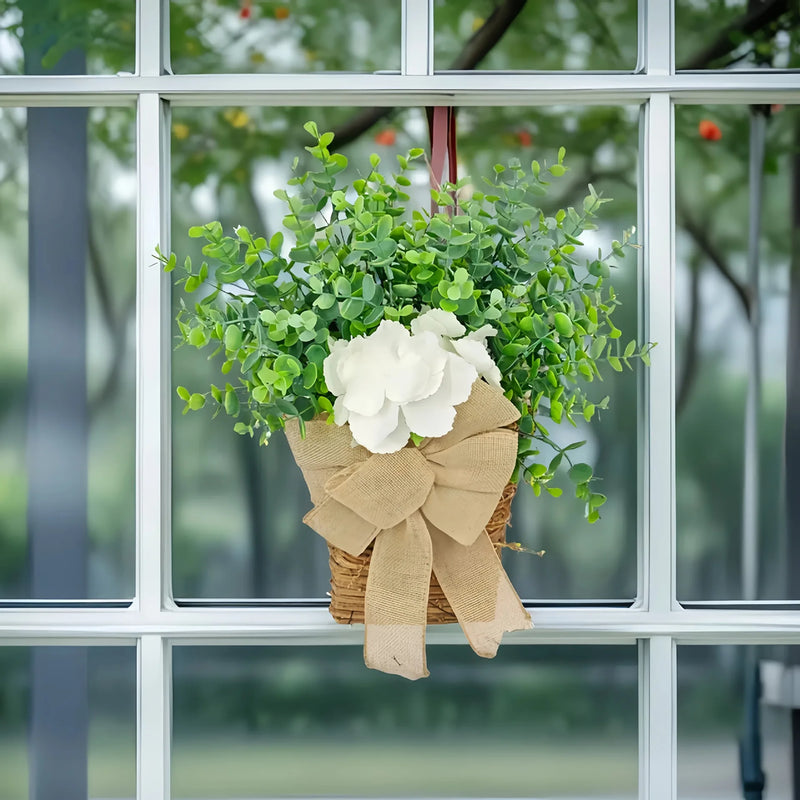 couronne de printemps en eucalyptus et fleurs blanches décorative