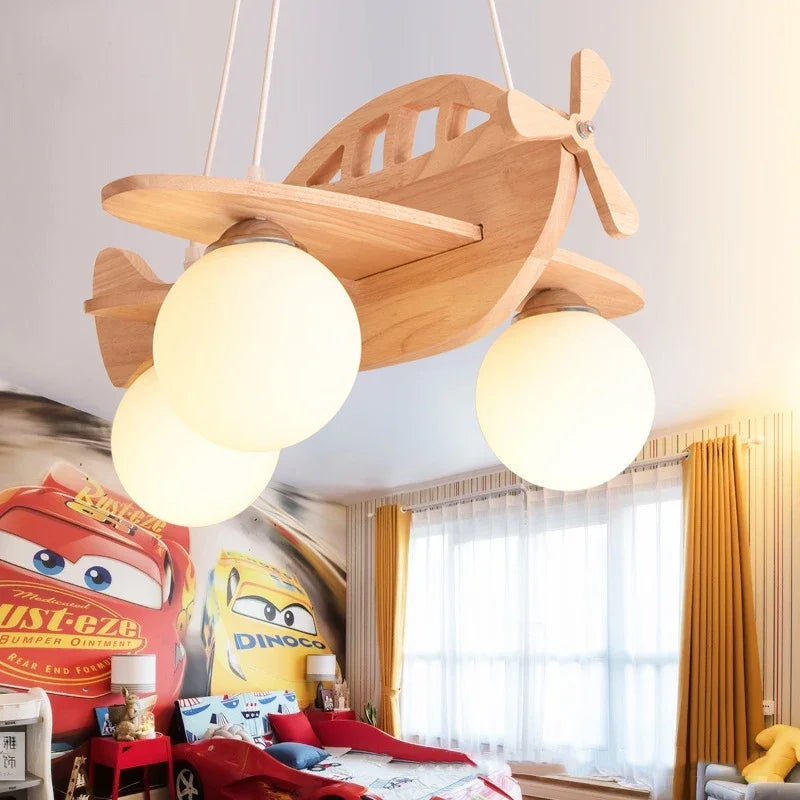 lustre moderne en bois fait main pour chambre enfant décor avion