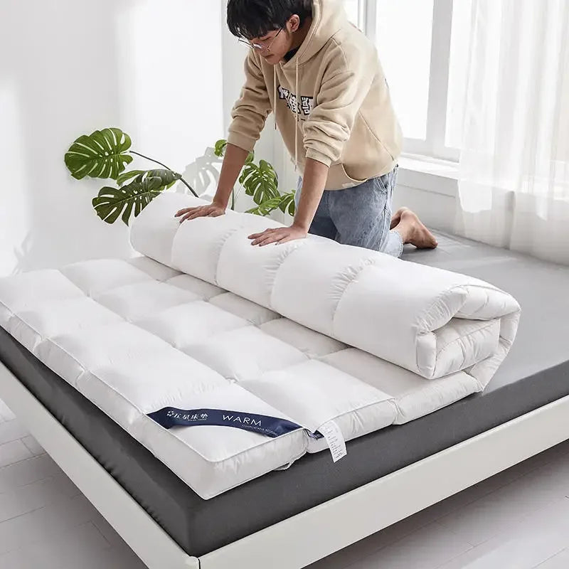 matelas moelleux en plumes surmatelas haut de gamme pour confort optimal