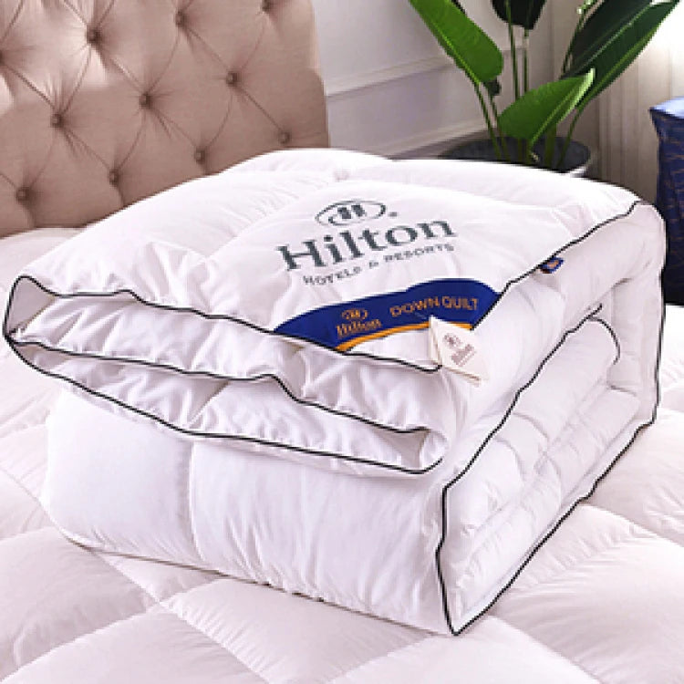 couette en duvet Hilton luxe pour couples qualité hôtelière 5 étoiles