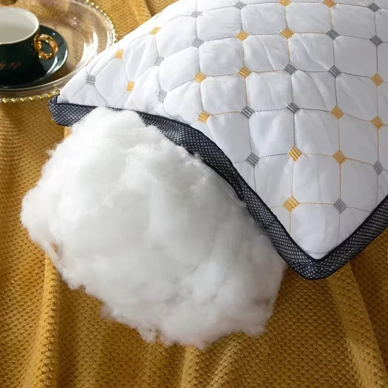 oreiller doux en coton et plumes pour un confort optimal