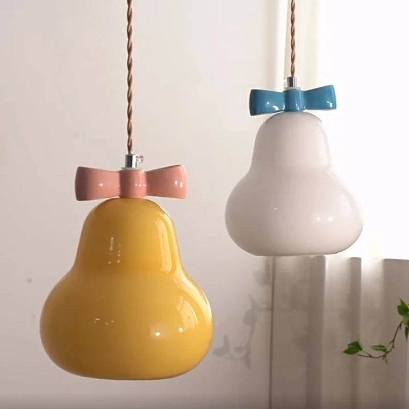 suspension en verre avec nœud rose pour chambre enfant