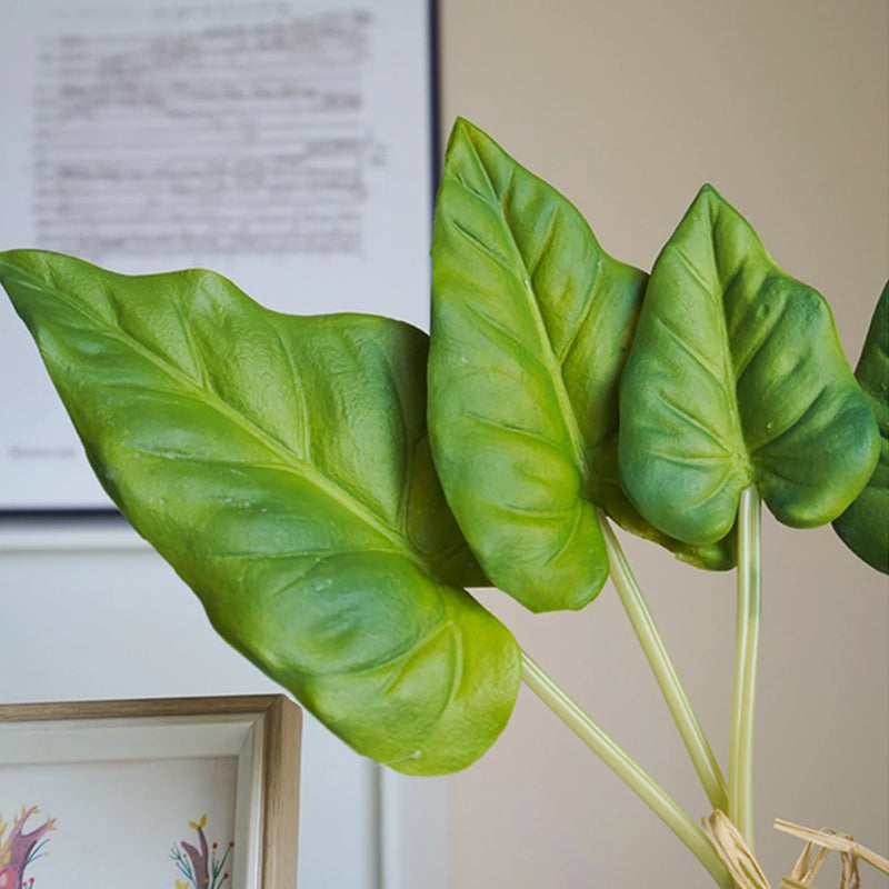 bouquet de feuilles monstera et bananier décoration intérieure mariage