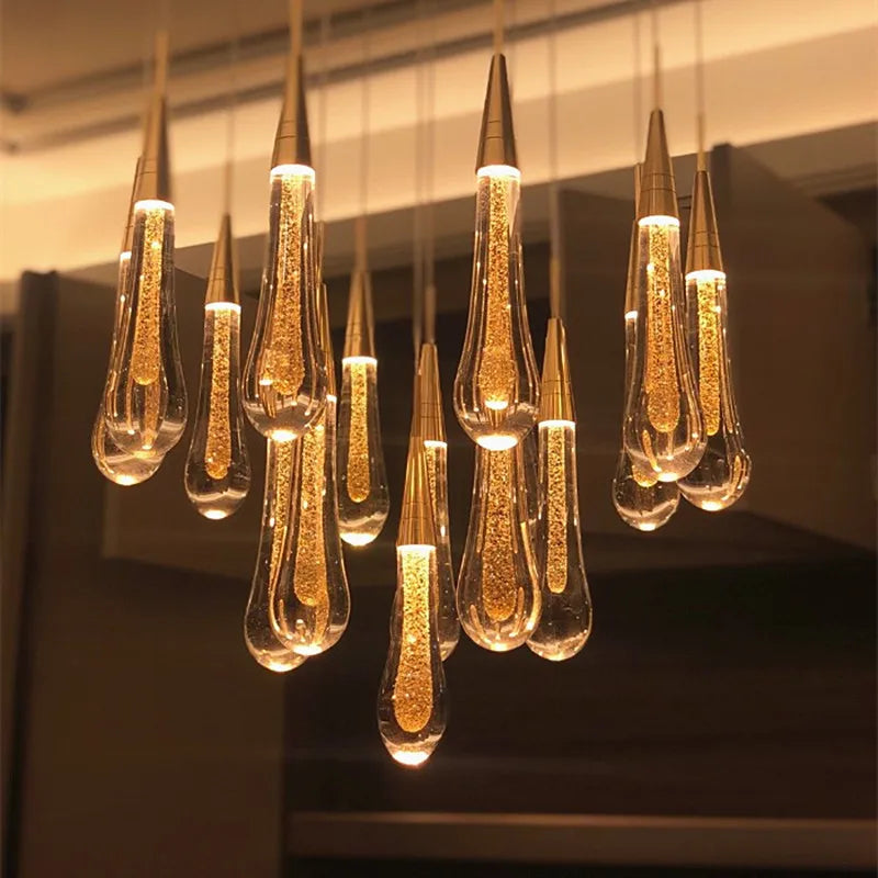 lustre créatif en cristal en forme de goutte d'eau dorée rotatif