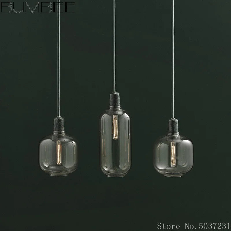 suspension en verre avec détail en marbre design industriel élégant