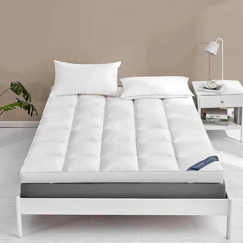 matelas moelleux en plumes surmatelas haut de gamme pour confort optimal