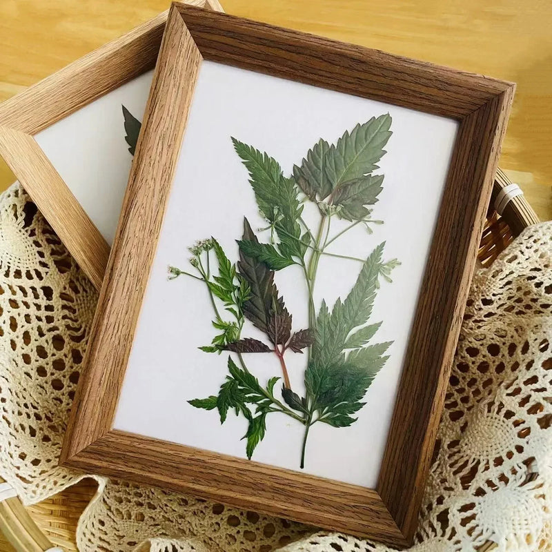 cadre photo en bois avec feuille décorative fait main