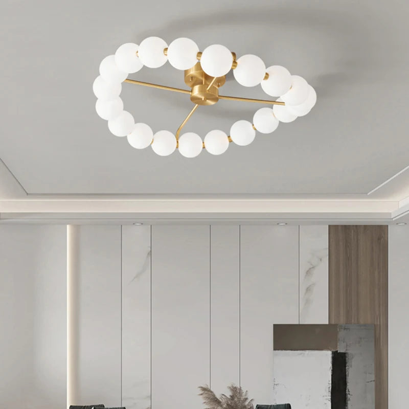 lustre à led avec anneau en cuivre et boule acrylique