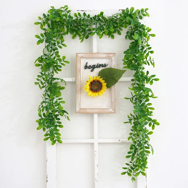 couronne de feuilles d'eucalyptus et glycine décorative pour fêtes