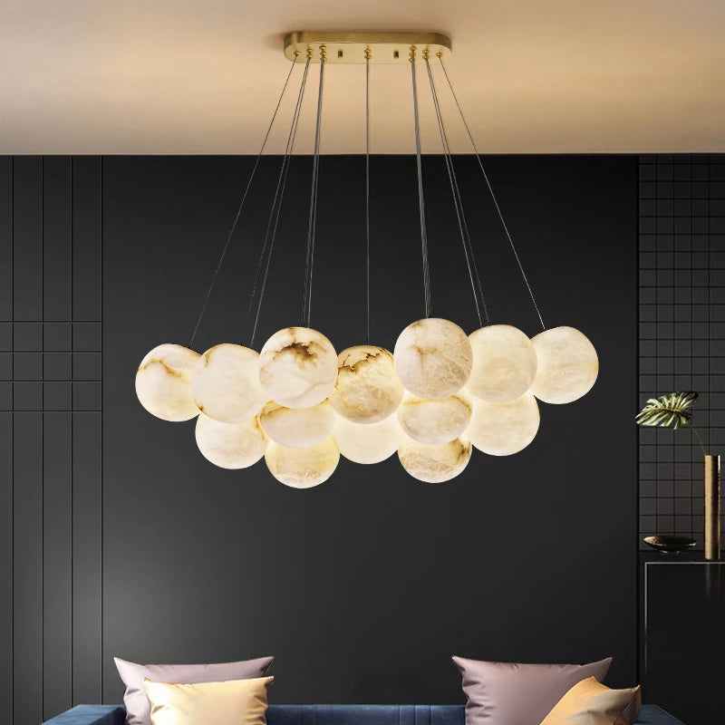 lustre à bulles en marbre or et noir design moderne pour intérieur