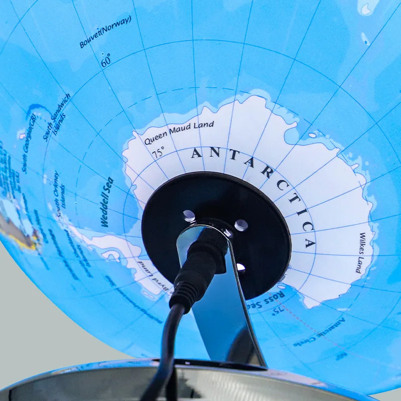 globe terrestre lumineux avec carte du monde éducative