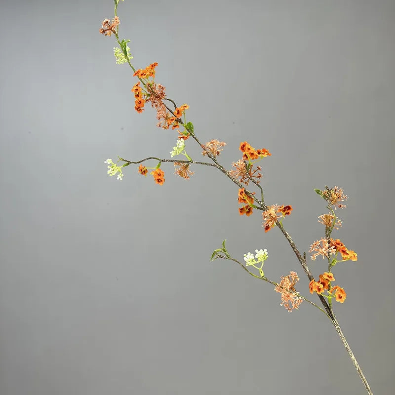 décoration de table en fleurs artificielles et saule neige