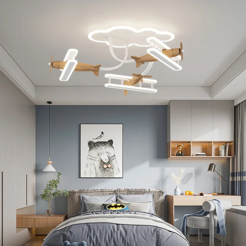 plafonnier avion en bois pour chambre d'enfant moderne et chaleureux