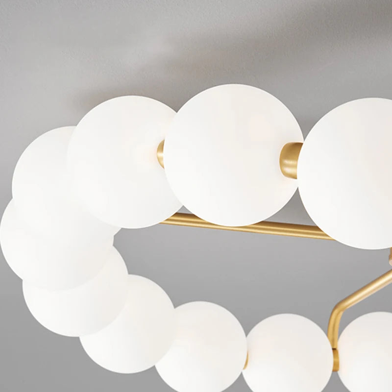 lustre à led avec anneau en cuivre et boule acrylique