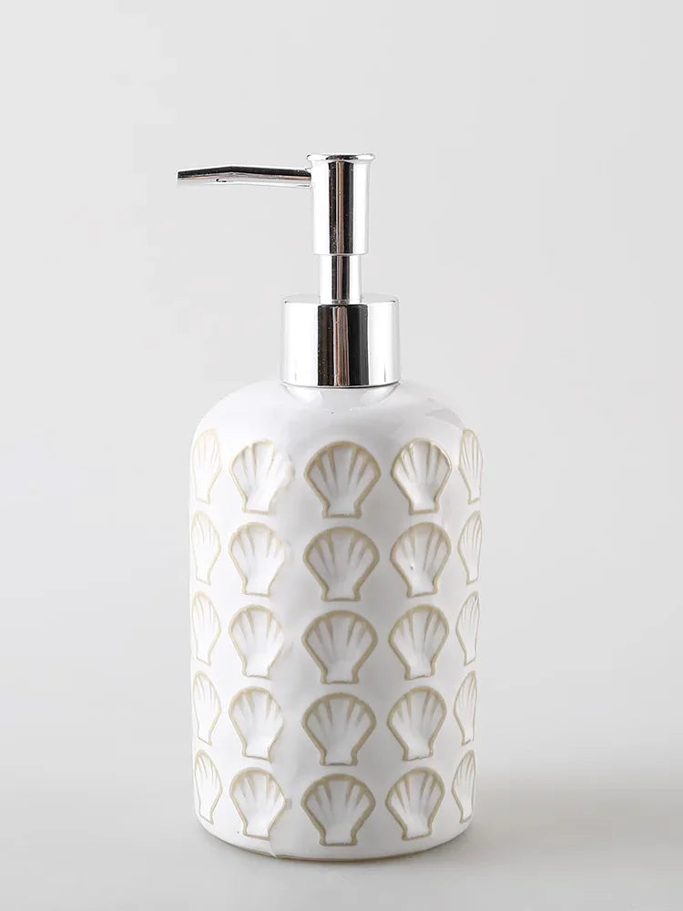 bouteille de lotion céramique en relief avec coquillages pour salle de bain