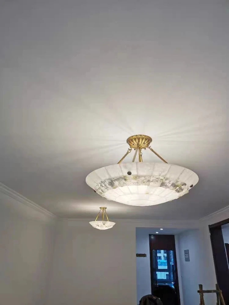 lustre minimaliste en cuivre et marbre design moderne