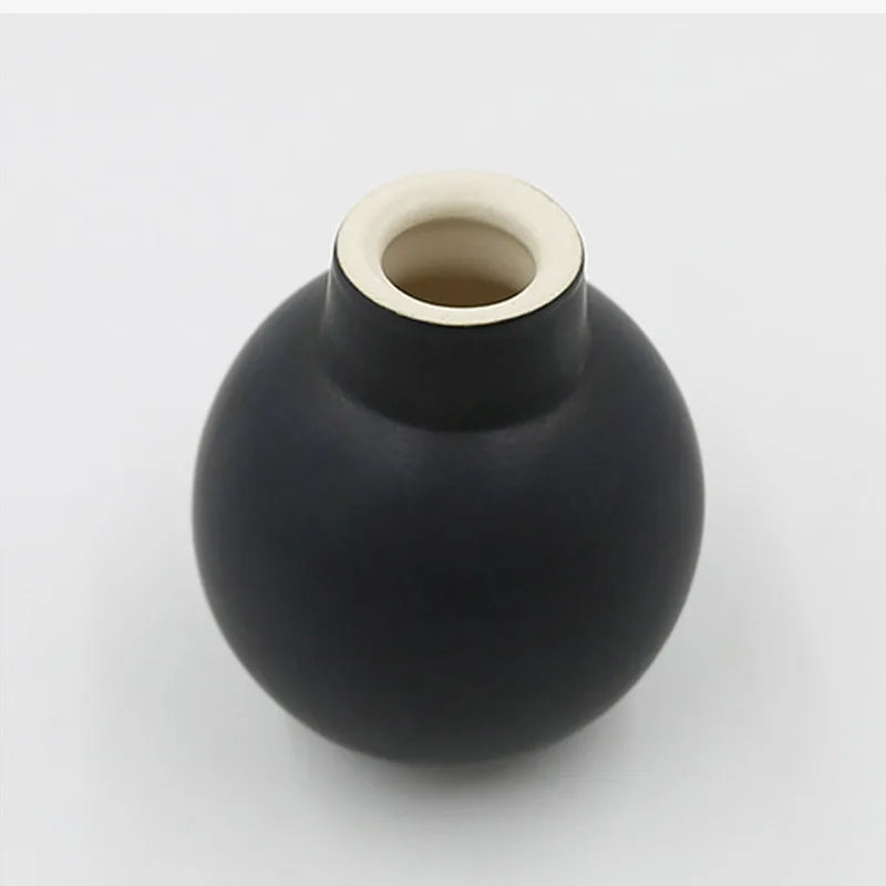 vase-nordique-en-c-ramique-maill-e-d-coration-moderne-g-om-trique-5.png