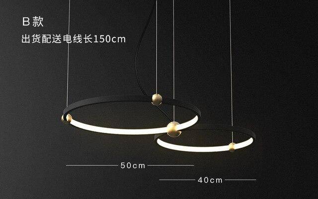 Design chandelier with LED rings and golden balls